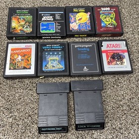 Atari 2600 System Bundle with Console, 30 Games, Joystick, Paddles, and More LOT