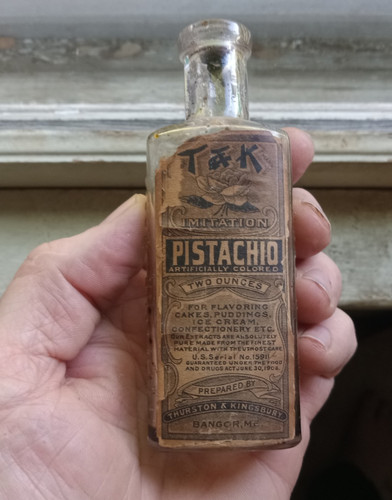 1906 ERA T&K PISTACHIO FLAVORING EXTRACT BANGOR,ME HAND BLOWN BOTTLE WITH LABEL