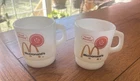 2 VINTAGE MCDONALDS ANCHOR HOCKING FIRE KING MILK GLASS GOOD MORNING COFFEE MUGS
