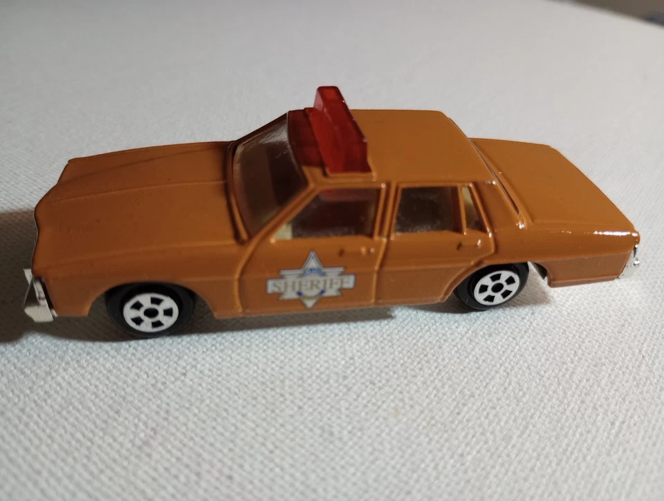 Coche de policía 1980 ERTL Smokey and The Bandit Sheriff Pontiac Bonneville dorado 5 velocidades  Foto 2 de 4