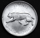 1967 25¢ silver coin in a paper flip