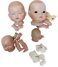 Vintage Lot of 4 Porcelain Bisque Baby Doll Heads with Hands and Booties 1981-86