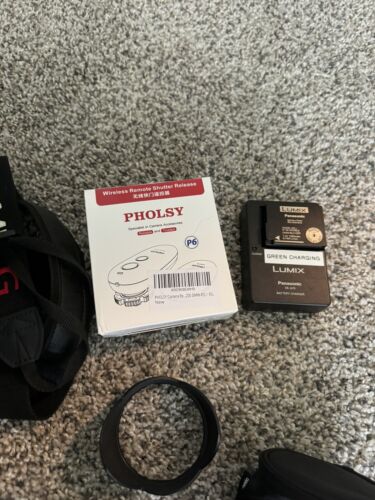 G85 LUMIX Bundle With LUMIX G X Vario 12-35mm Lens And Olympus Lens - Picture 10 of 21