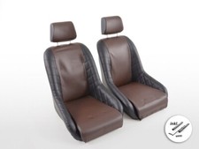 Sedili d'epoca avvolgenti stile retrò marrone scuro neri con poggiatesta e binar