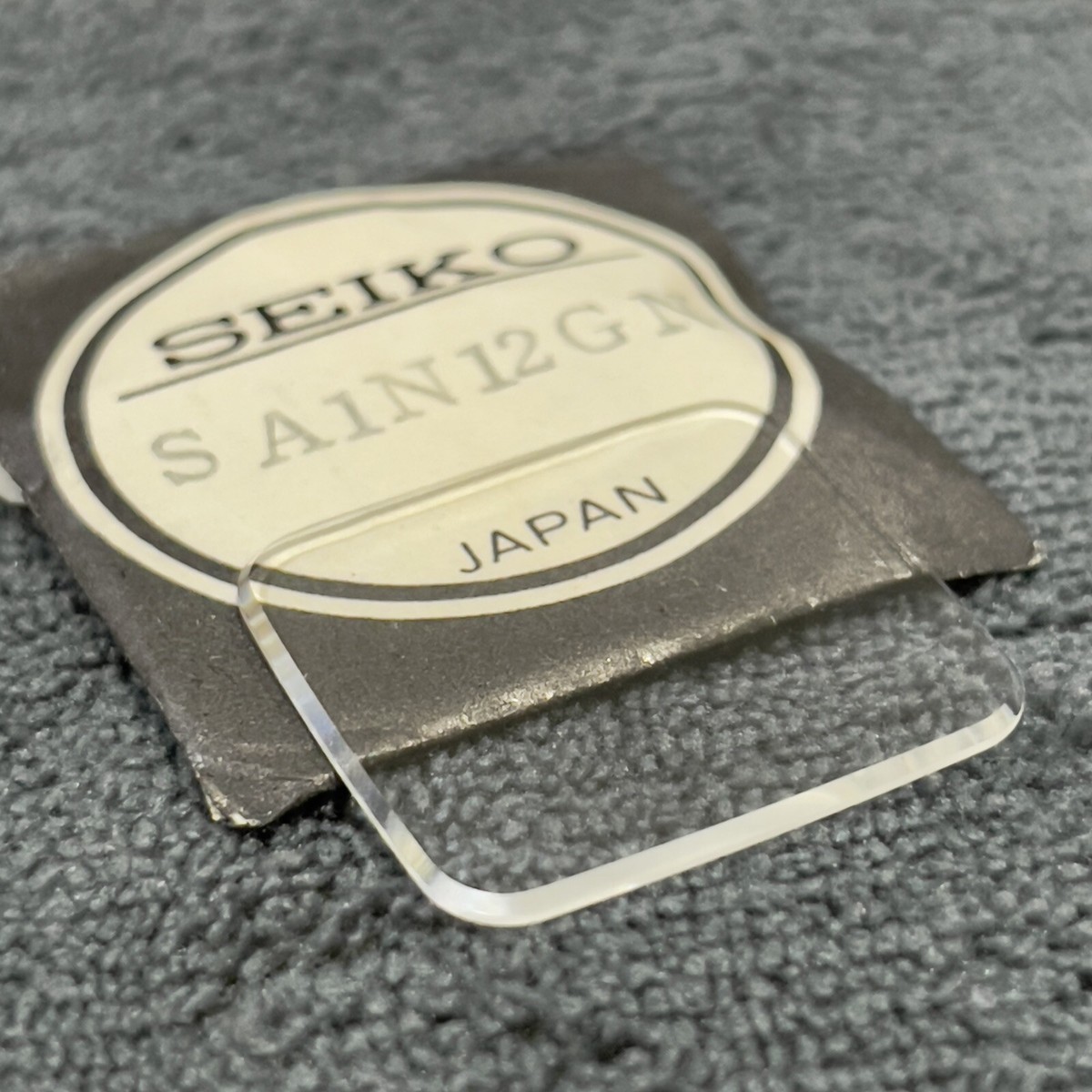 NOS GENUINE CRYSTAL SEIKO 5606-5190 EMBLEM 5626-5090