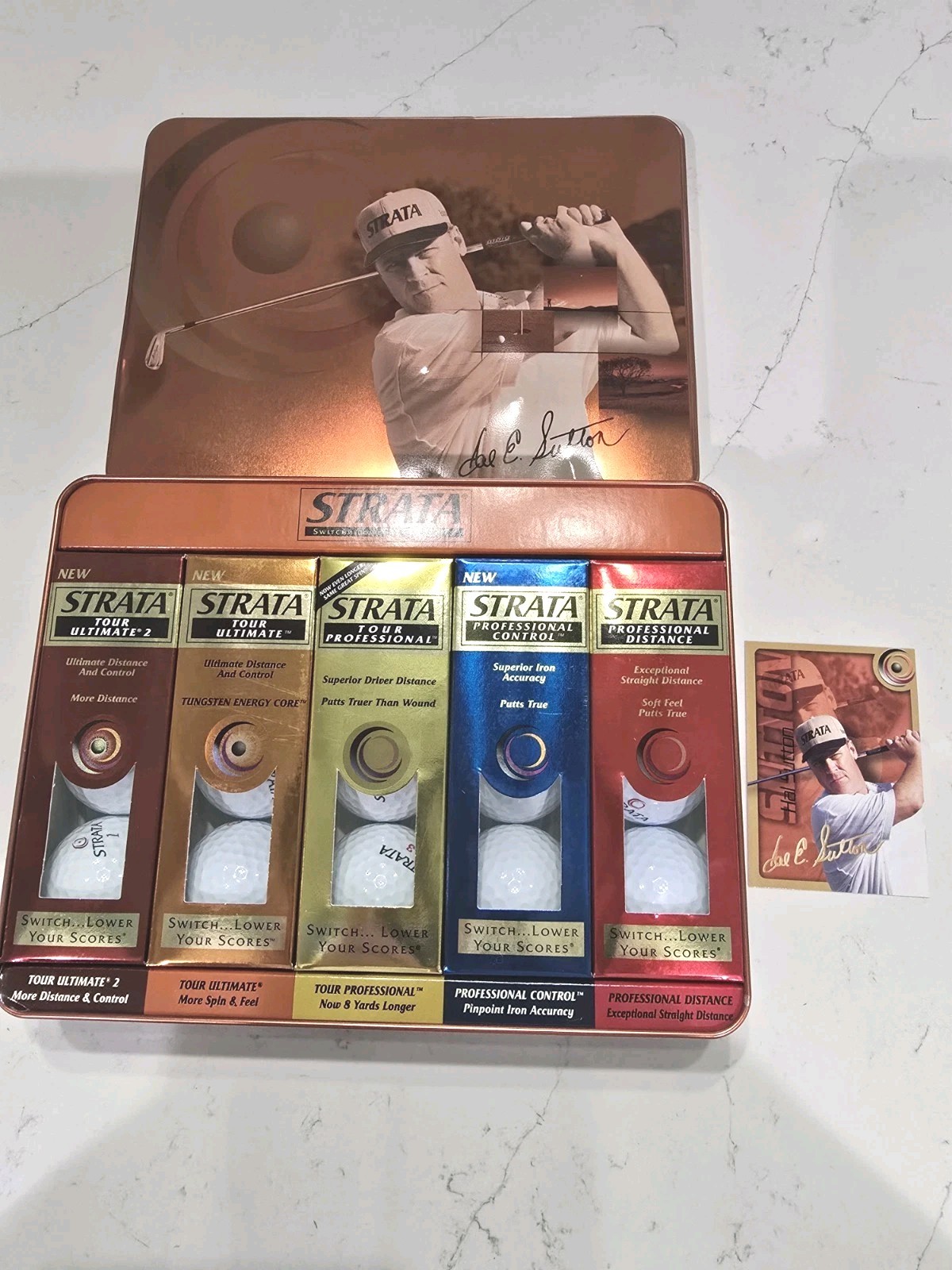 COMMEMORATIVE STRATA HAL SUTTON 15 BALL TIN WITH SLEEVES AND BIO CARD FROM 2002