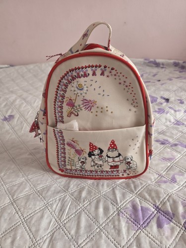 Cath Kidston ecru-colored children's backpack with the "A Stitch In Time" print.