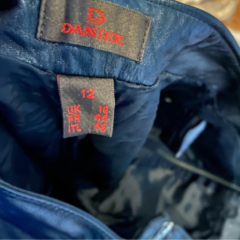 Pantalón de cuero genuino pierna ancha vertical cremallera frontal Foto 4 de 4