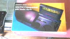 Sharper Image Am/Fm Companion with Smoke Alarm Clock/Radio NIB FREE SHIPPING