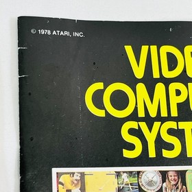 Atari 2600 Console Bundle: Joysticks, Paddles, Atari Force Comic, Organizer, Pin