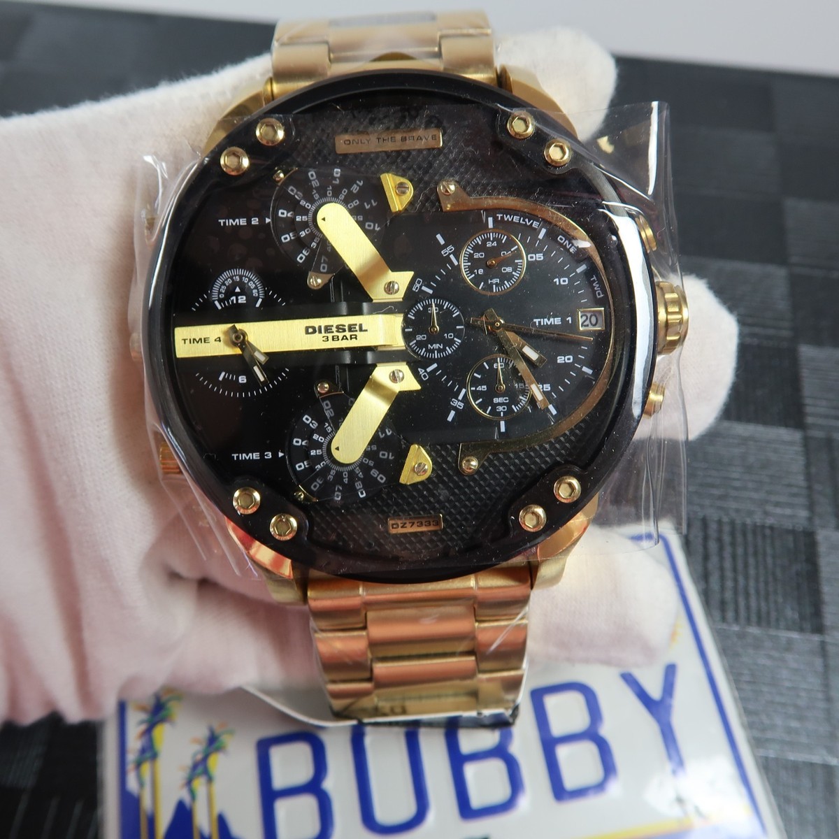 gold tone diesel watches in gold