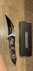 WarTech Black/Red/Silver Skeleton Graphic Plain Blade Manual Pocketknife — photo 1