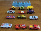 Lot of 12 Vintage Matchbox Cars & Trucks In Blue Plastic Car Holder