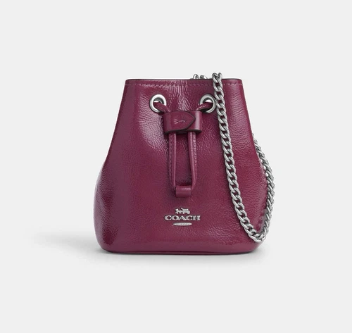 Borsa Coach con coulisse da polso in pelle verniciata argento rosa nuova con etichetta CZ028