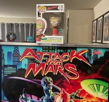 Figura Funko Pop Mars Attacks: Embajador Marciano con Protector