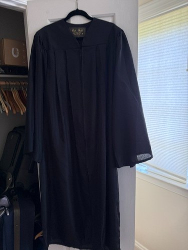 Graduation gown, black . Zipper front. Fits 6'0" to 6'2"