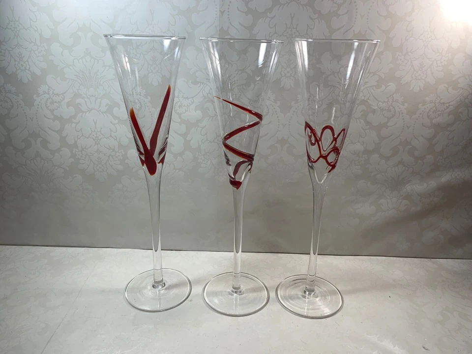 Set Of 3 Clear Swirline Glass Champagne Flutes Red Embossed Mixed Designs - Image 4 of 4