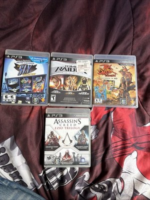 ps3 games lot bundle  Tomb Raider Sly Cooper Jak And Daxter Assassins Creed