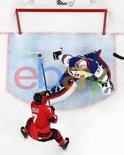 Connor Hellebuyck 2026 Olympics Stick Save Winnipeg Jets 8x10 NHL Hockey Photo