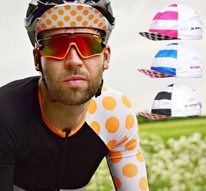 wearing a hat under a bike helmet