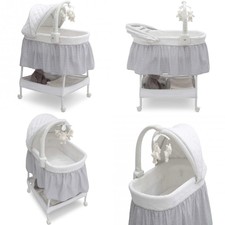 delta deluxe gliding bassinet