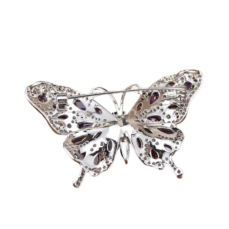 Broche broche mariposa circonita cúbica púrpura chapado en oro blanco Foto 3 de 3