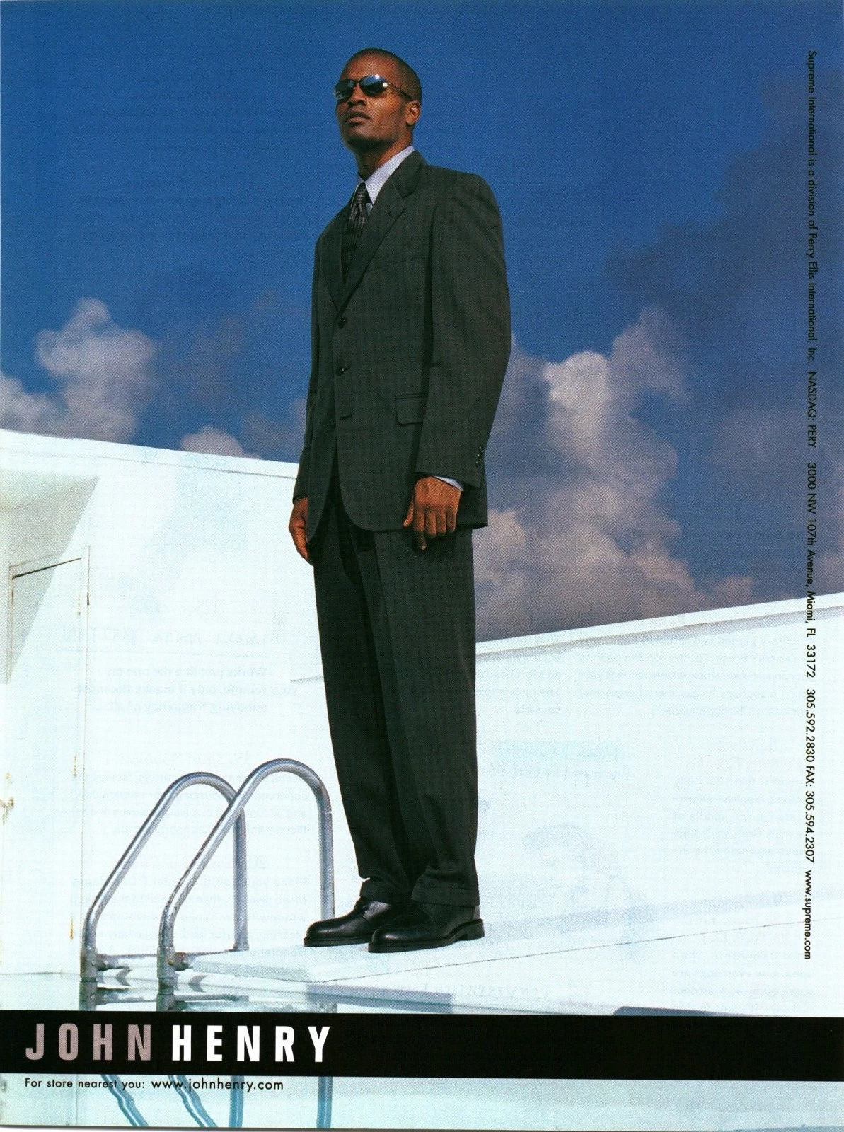 PUBLICITÉ IMPRIMÉE 2001   VÊTEMENTS DE MODE JOHN HENRY SUPRÊME INT. AD   PUBLICITÉ COSTUME NOIR