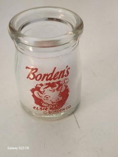 BORDEN'S ELSIE CREAMER ELSIE FACE 2" HIGH 1 1/4" AT BOTTOM.