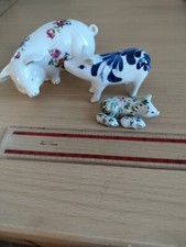 Ornamental pigs China pig collection.Largest approximately 5" long and 2.3" high