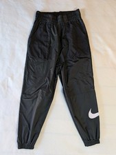 Pantalones deportivos Nike Swoosh tejidos para mujer negros cortavientos joggers para mujer S