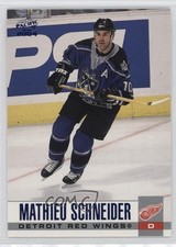 2003-04 Pacific Blue 10/250 Mathieu Schneider #125 0nr3