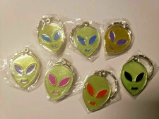 Vintage Alien Keychain Green or Yellow Face Colorful Eyes Silver Lot of 4  NOS