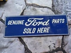VINTAGE GENUINE FORD PARTS SOLD HERE PORCELAIN SIGN 12"x4"