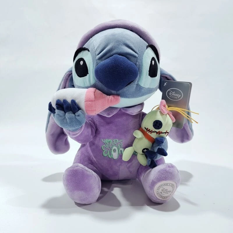 Peluche LILO et STITCH Bébé Pyjama - Baby Doll - H 28 cm - Disney  Disneyland Paris