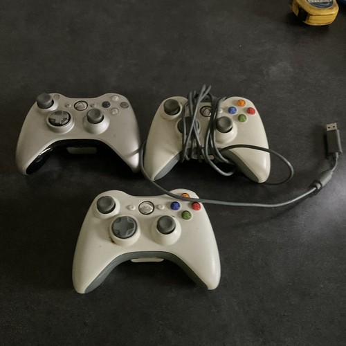Pair of Xbox 360 wireless controllers, 1 Silver Controller Wireless Tested Works