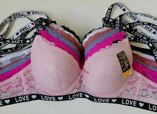 NEW ladies  sexy lace bras....lot of 3  bras  asst color push- up " love"  .