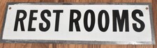 Vintage RESTROOMS Metal Advertising Sign