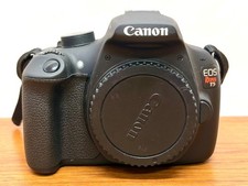 Canon EOS Rebel T5 18MP Digital SLR Camera Body with charger and 2 batteries