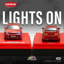 KYOSHO 1:64 NISSAN NISMO 400R TAS KL EDITION IN RED WITH MOTN LED BASE