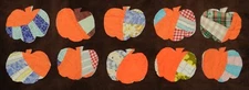 10 PRIMITIVE ANTIQUE CUTTER QUILT PUMPKINS! Orange and multi colors