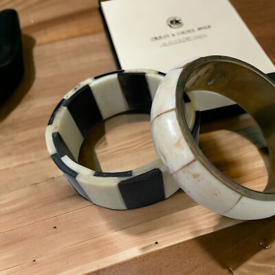 2 Bangle bracelets 1 resin 1 made of oxe bone A231