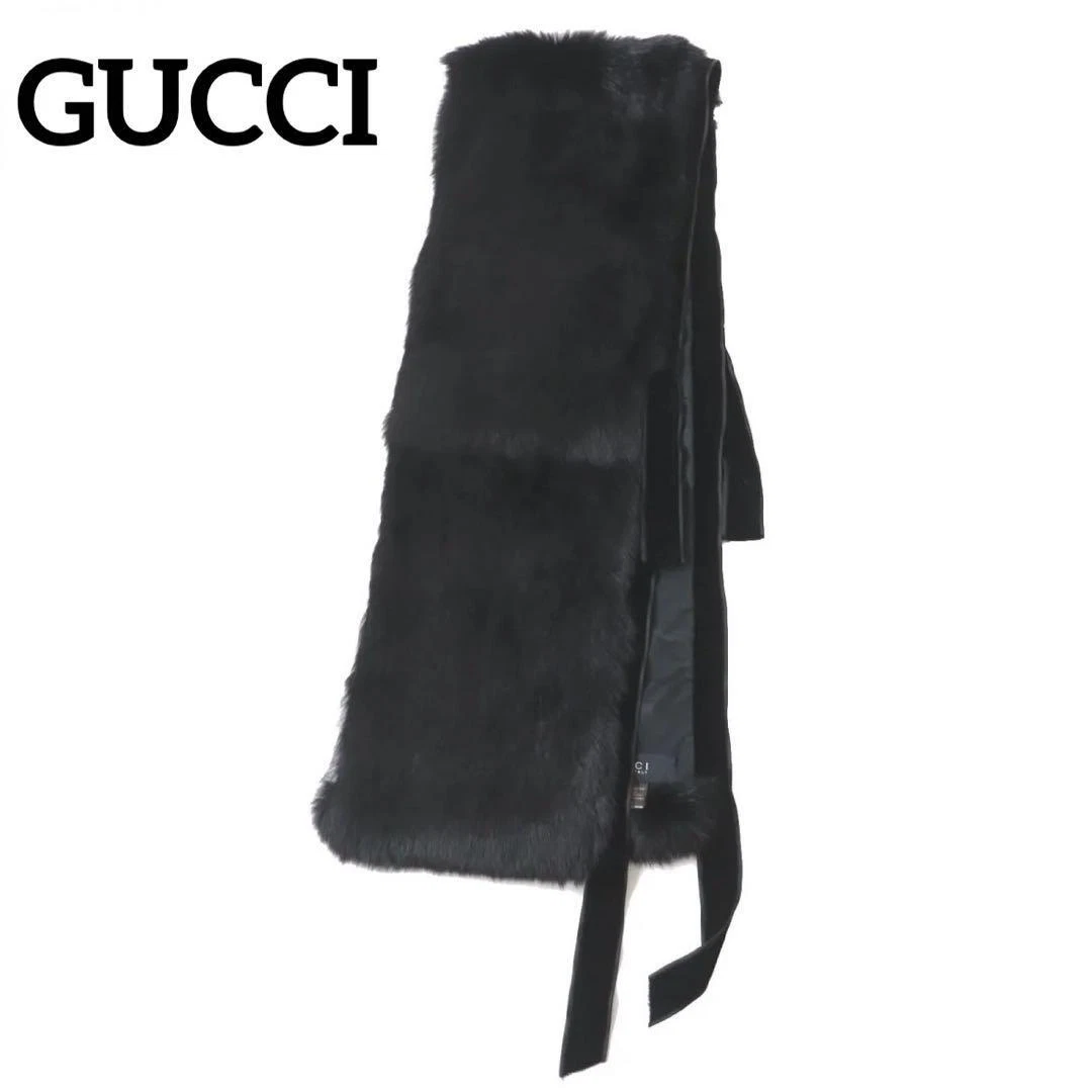 Étole fourrure GUCCI noire motif GG doublure fabriquée en Italie avec sac de rangement