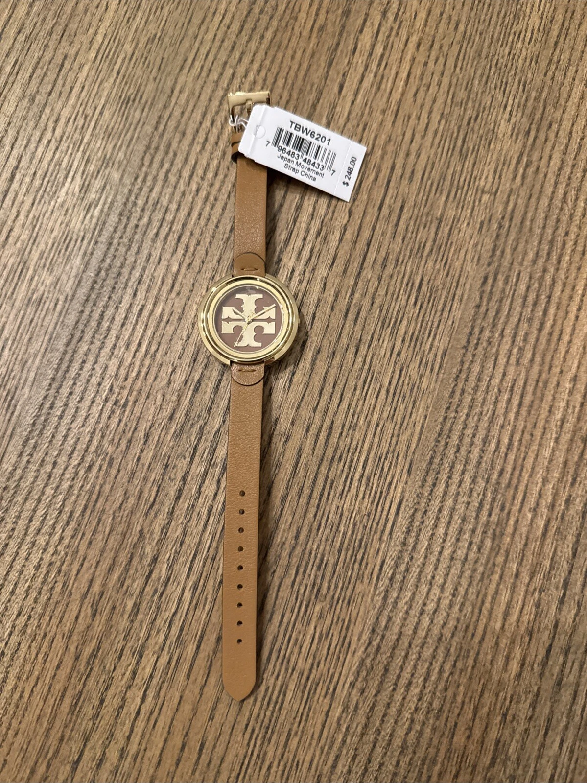 Orologio da donna Tory Burch oro e marrone bagagli pelle mugnaio TBW6201