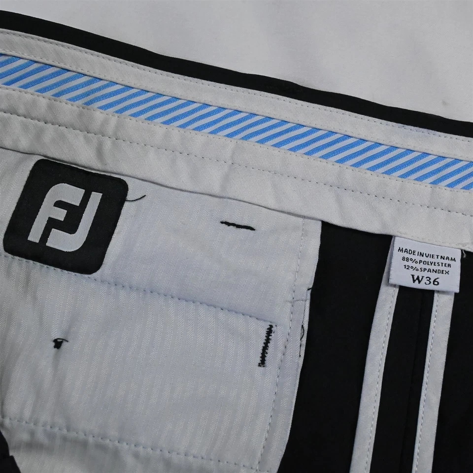 Pantalones cortos chinos FootJoy 36 x 10" negros que absorben el rendimiento de golf flexibles Foto 3 de 4