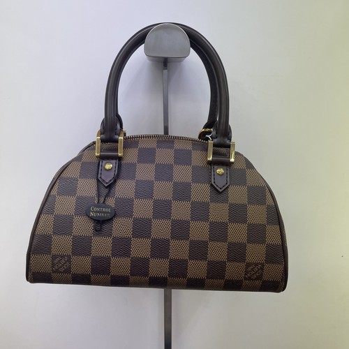 jenni rivera louis vuitton