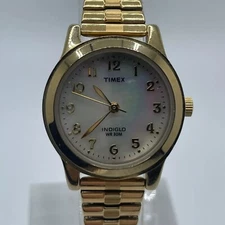 Timex Indiglo Watch Womens 26mm Case Pearl Look Dial Stretch Bracelet Quartz