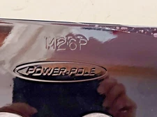 Power Pole Jack Plate Side Adapter M-2-6-P BLACK, with mounting hardware.