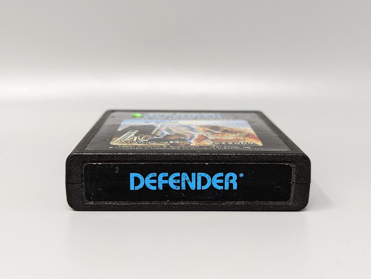 Bon état - Jeu Defender Pour Atari 2600 (CX2609) Avec étiquette Bleue, Instructions Incluses