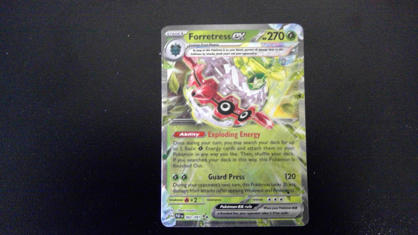 Forretress ex SV002/091 Holo from Paldean Fates TCG Set