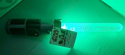 New M & M Green Star Wars Light Saber With Candy Storage. Lights Up
